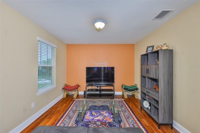 2605 Stardale Way, Lutz, FL 33558 - living area featuring wood finished floors and baseboards