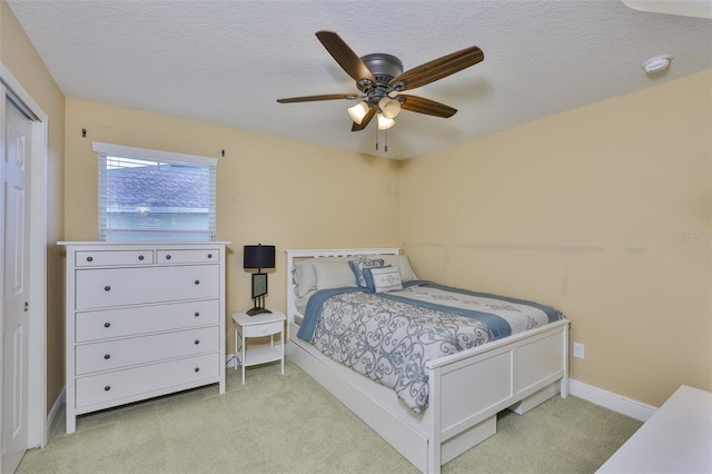 2605 Stardale Way, Lutz, FL 33558 - bedroom with carpet, a textured ceiling, and ceiling fan