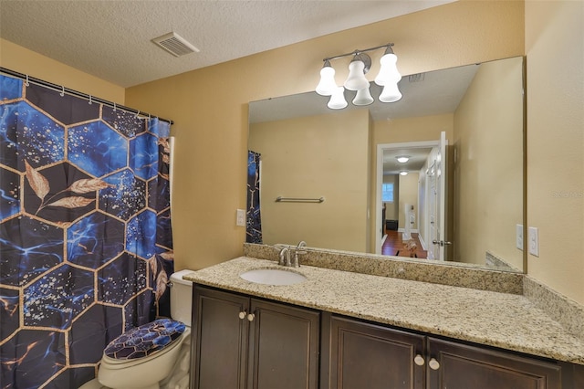 2605 Stardale Way, Lutz, FL 33558 - bathroom featuring vanity, a chandelier, curtained shower, and a textured ceiling