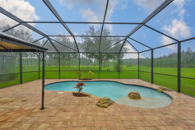 2605 Stardale Way, Lutz, FL 33558 - outdoor pool with a patio, glass enclosure, and a lawn