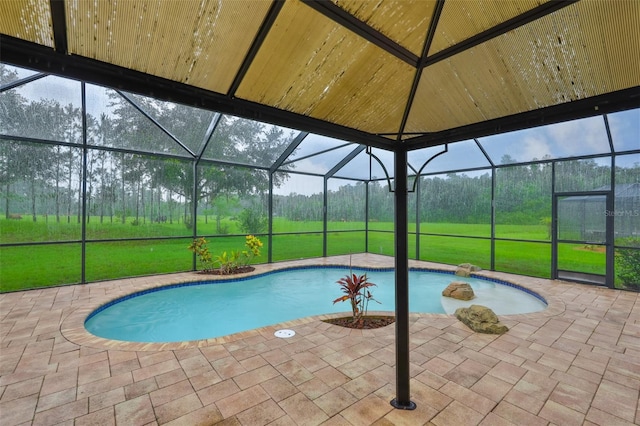 2605 Stardale Way, Lutz, FL 33558 - outdoor pool featuring glass enclosure and a patio area