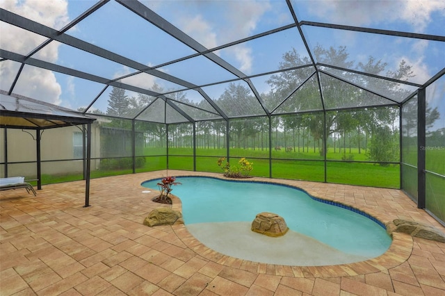 2605 Stardale Way, Lutz, FL 33558 - outdoor pool with a patio and glass enclosure