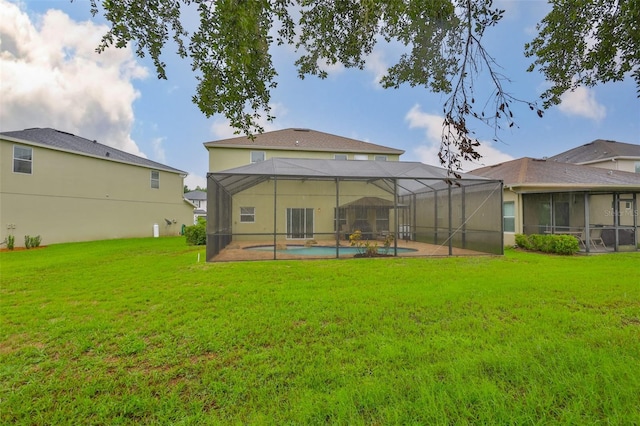 2605 Stardale Way, Lutz, FL 33558 - rear view of property with a lawn, an outdoor pool, and a lanai