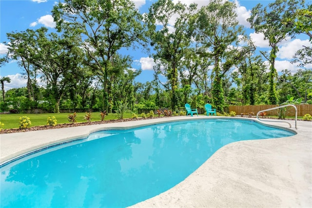 4723 Bloomingdale Ave, Valrico, FL 33596 - outdoor pool featuring view of scattered trees and a patio area