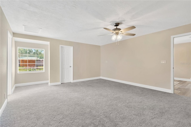 4723 Bloomingdale Ave, Valrico, FL 33596 - empty room with light colored carpet and a ceiling fan