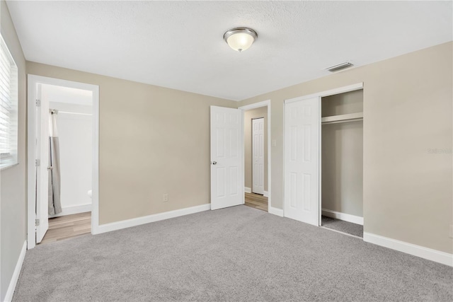 4723 Bloomingdale Ave, Valrico, FL 33596 - unfurnished bedroom featuring carpet floors and a closet
