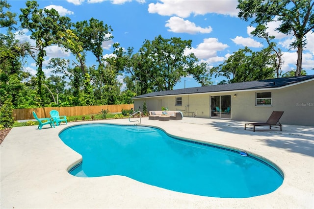 4723 Bloomingdale Ave, Valrico, FL 33596 - view of swimming pool with a patio area and an outdoor living space