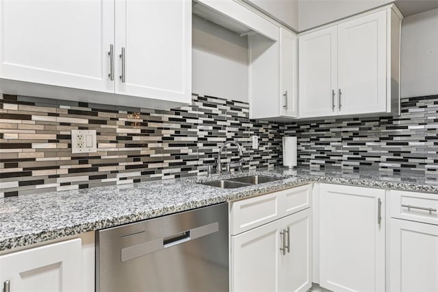 923 April Hills Blvd, Lady Lake, FL 32159 - kitchen with dishwasher, backsplash, white cabinets, and light stone countertops