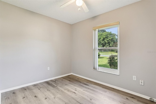 923 April Hills Blvd, Lady Lake, FL 32159 - empty room with a ceiling fan and wood finished floors