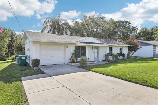 923 April Hills Blvd, Lady Lake, FL 32159 - single story home with a garage, a front lawn, concrete driveway, and concrete block siding