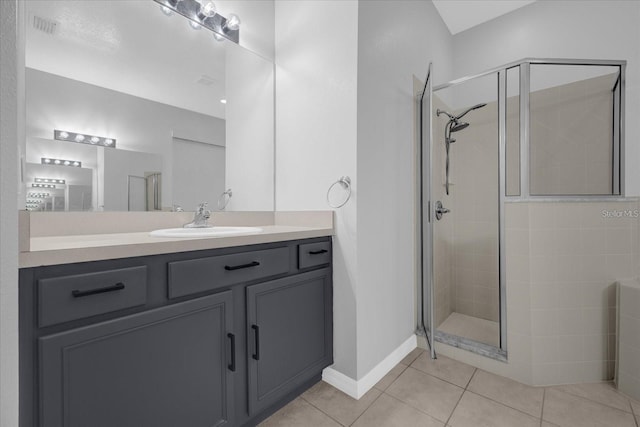 320 Tupelo Cir, Davenport, FL 33897 - full bathroom with a stall shower, vanity, tile patterned flooring, and a tub to relax in