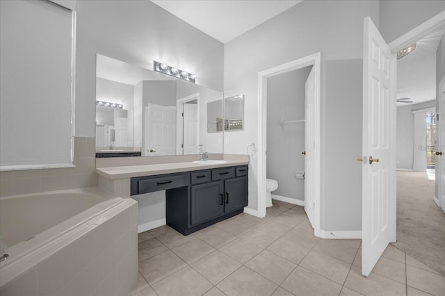 320 Tupelo Cir, Davenport, FL 33897 - bathroom with vanity, a bath, and tile patterned flooring