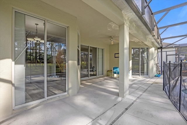320 Tupelo Cir, Davenport, FL 33897 - view of patio featuring ceiling fan and glass enclosure