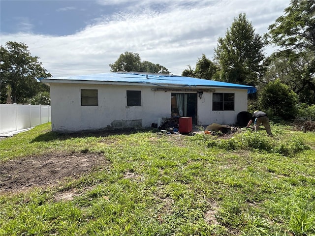 16107 Sea Pines Dr, Hudson, FL 34667 - back of house featuring stucco siding