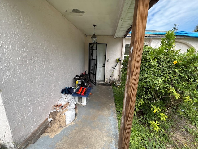 16107 Sea Pines Dr, Hudson, FL 34667 - doorway to property featuring stucco siding