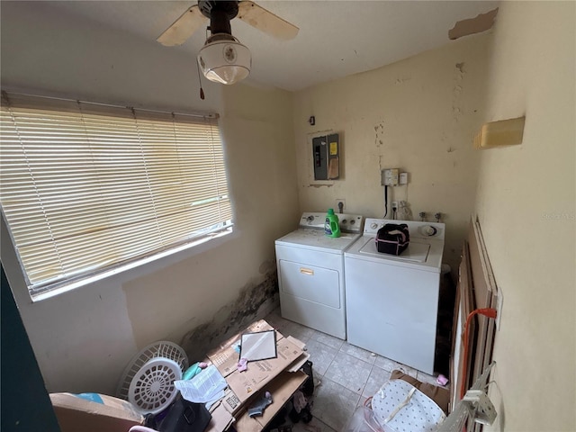 16107 Sea Pines Dr, Hudson, FL 34667 - laundry room featuring electric panel, washing machine and clothes dryer, ceiling fan, and light tile patterned flooring