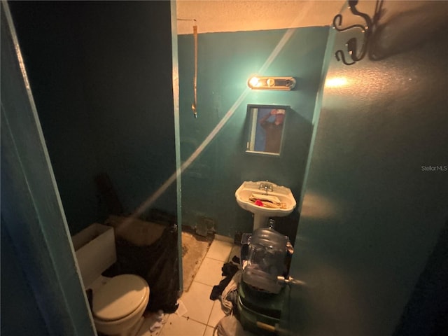 16107 Sea Pines Dr, Hudson, FL 34667 - bathroom featuring toilet and tile patterned flooring