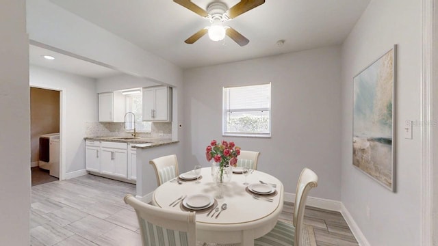 8609 N 11th St, Tampa, FL 33604 - dining space with washer / dryer, ceiling fan, and recessed lighting