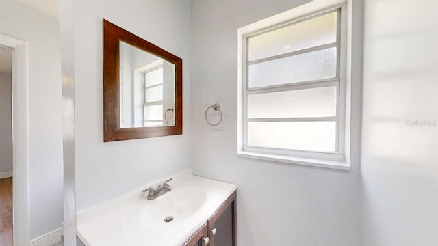8609 N 11th St, Tampa, FL 33604 - bathroom featuring vanity and baseboards