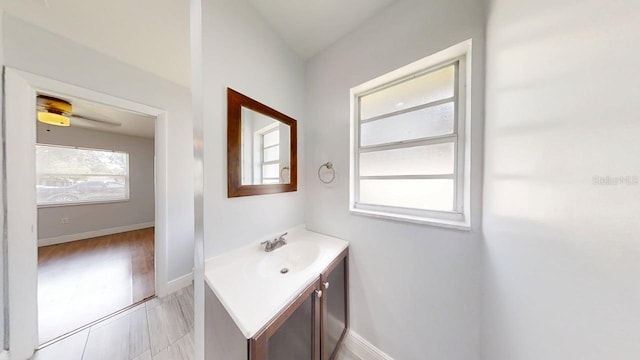 8609 N 11th St, Tampa, FL 33604 - bathroom with vanity and baseboards
