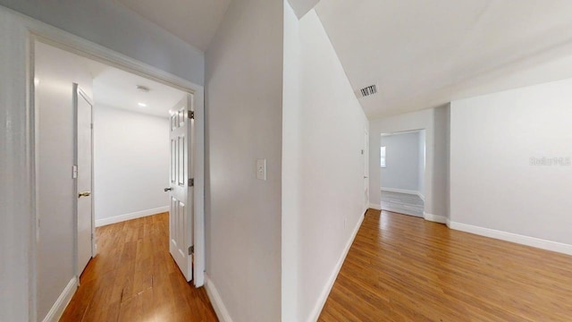 8609 N 11th St, Tampa, FL 33604 - hall featuring light wood finished floors and lofted ceiling