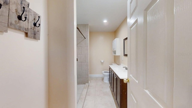 8609 N 11th St, Tampa, FL 33604 - bathroom featuring vanity, a shower, tile patterned flooring, and recessed lighting