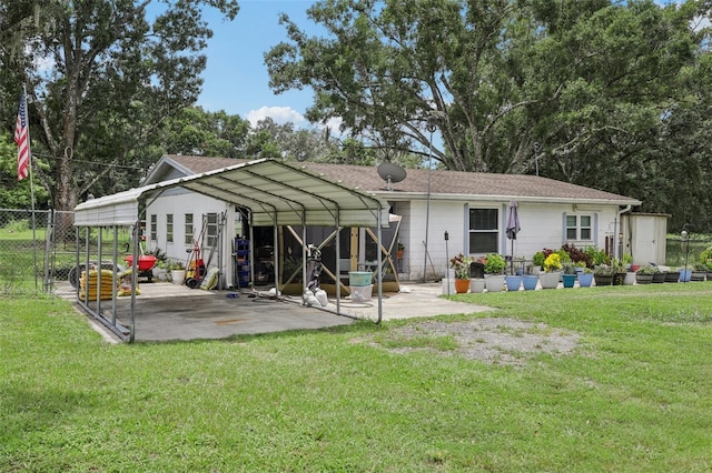 127 Locke Rd, Davenport, FL 33837 - rear view of property with a carport and a patio
