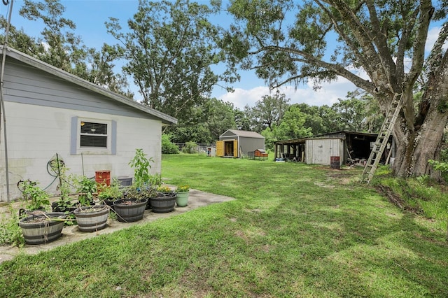 127 Locke Rd, Davenport, FL 33837 - view of green lawn featuring an outbuilding
