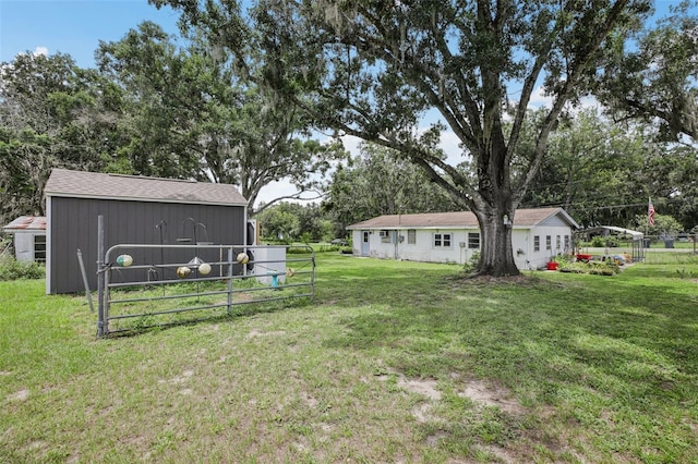 127 Locke Rd, Davenport, FL 33837 - view of yard featuring view of wooded area and an outbuilding