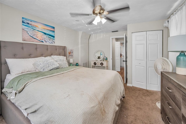 6053 11th Ave, New Port Richey, FL 34653 - bedroom featuring carpet floors, a closet, and a ceiling fan