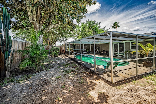 6053 11th Ave, New Port Richey, FL 34653 - view of pool featuring a fenced backyard, a lanai, and a patio area
