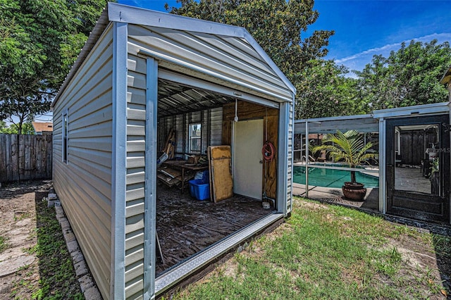 6053 11th Ave, New Port Richey, FL 34653 - view of outdoor structure with an outdoor pool