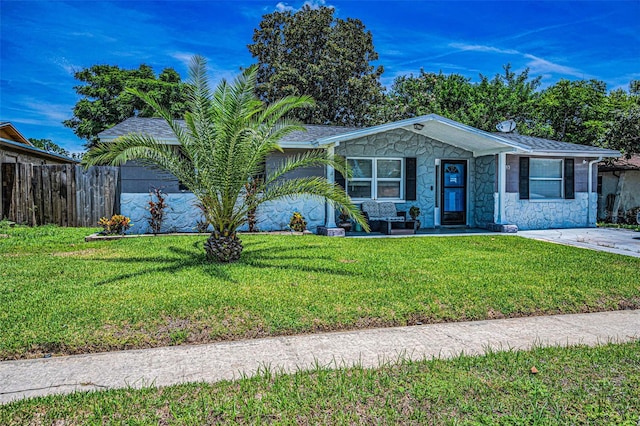 6053 11th Ave, New Port Richey, FL 34653 - view of front of home featuring stone siding