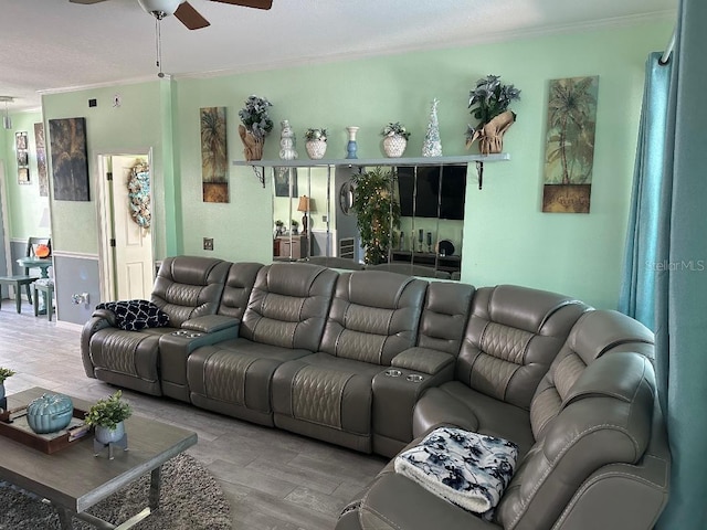10920 Sailbrooke Dr, Riverview, FL 33579 - living area featuring a ceiling fan, crown molding, wood finished floors, and a textured ceiling