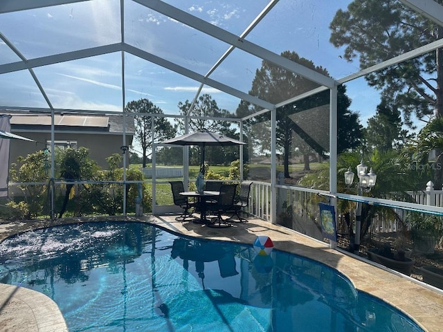 10920 Sailbrooke Dr, Riverview, FL 33579 - swimming pool featuring glass enclosure and a patio