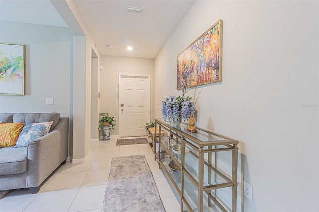 4954 Wild Senna Blvd, Tampa, FL 33619 - foyer entrance with light tile patterned flooring and baseboards