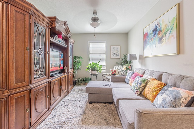 4954 Wild Senna Blvd, Tampa, FL 33619 - living room featuring ceiling fan and light colored carpet