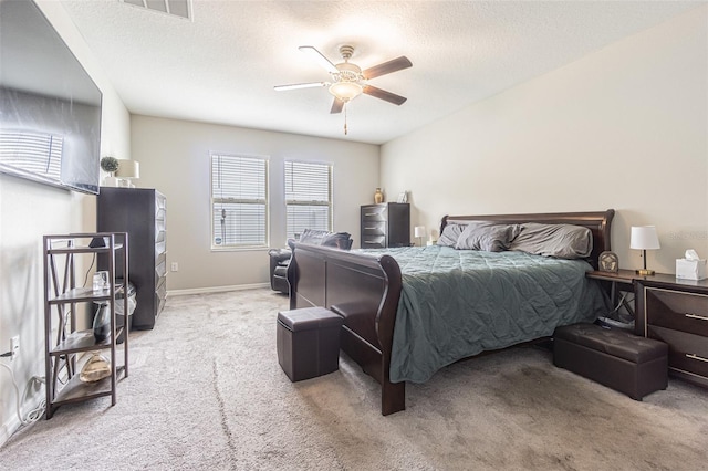 4954 Wild Senna Blvd, Tampa, FL 33619 - bedroom with carpet, a textured ceiling, and a ceiling fan