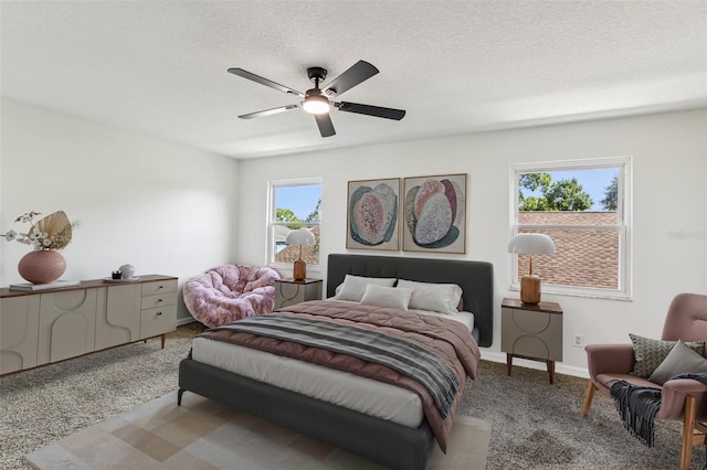 808 Franklin Cir, Palm Harbor, FL 34683 - bedroom featuring carpet, a textured ceiling, and ceiling fan