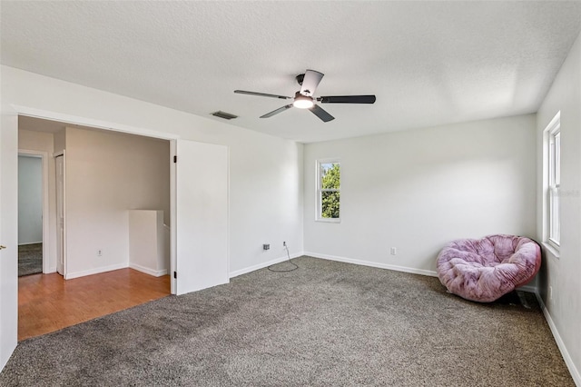 808 Franklin Cir, Palm Harbor, FL 34683 - carpeted spare room featuring ceiling fan and a textured ceiling