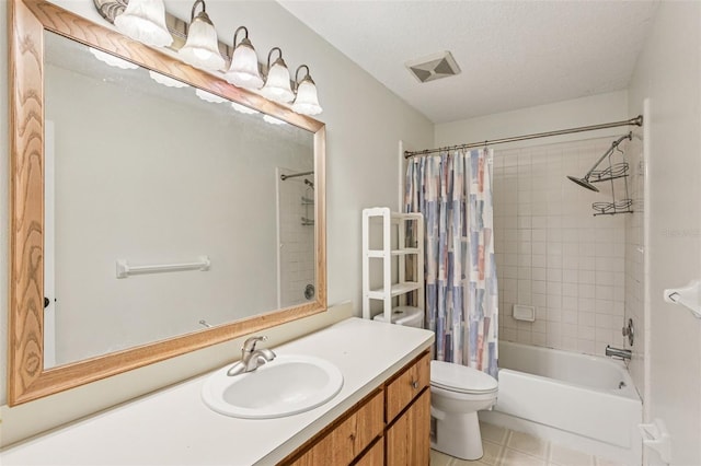 808 Franklin Cir, Palm Harbor, FL 34683 - bathroom with vanity, tile patterned flooring, shower / bathtub combination with curtain, and a textured ceiling