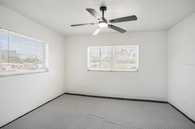 11830 86th Ave, Seminole, FL 33772 - carpeted spare room with healthy amount of natural light and ceiling fan
