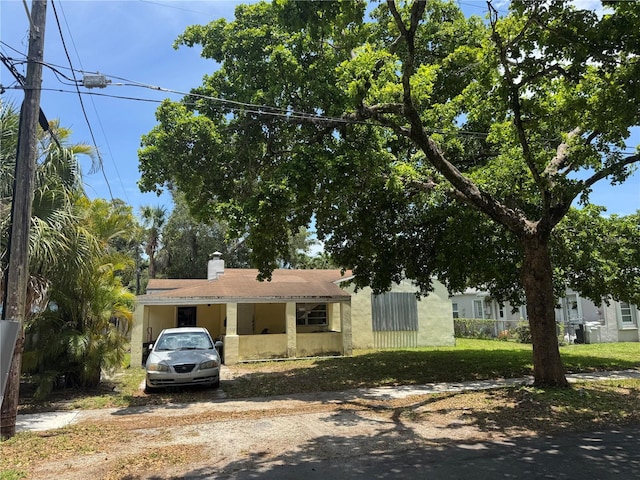 1712 SW 10th Ave, Fort Lauderdale, FL 33315 - view of front facade featuring a chimney