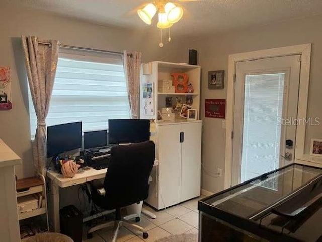 4487 Anderson Rd, Orlando, FL 32812 - office with light tile patterned floors and a ceiling fan