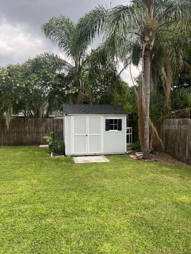 4487 Anderson Rd, Orlando, FL 32812 - view of shed featuring a fenced backyard