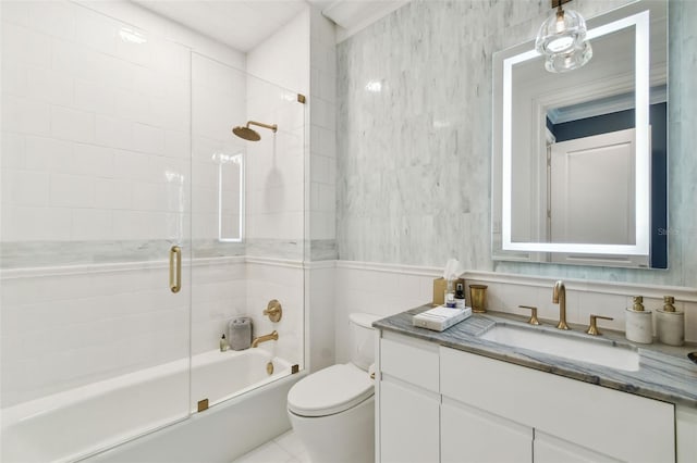 450 Knights Run Ave Unit 2004, Tampa, FL 33602 - bathroom featuring vanity, shower / bath combination with glass door, and tile walls