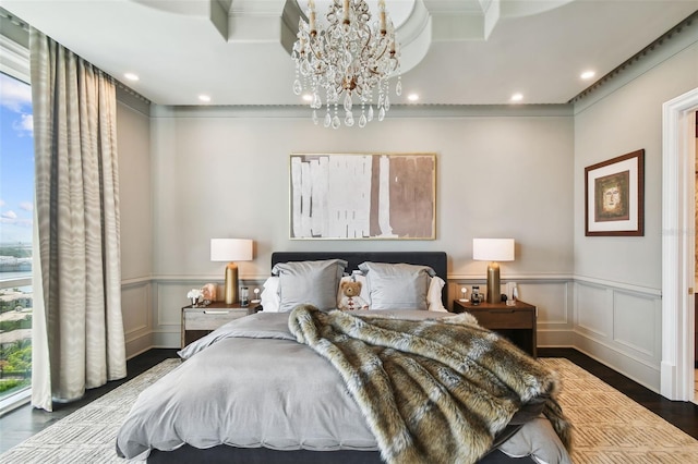 450 Knights Run Ave Unit 2004, Tampa, FL 33602 - bedroom with wood finished floors, a chandelier, crown molding, a wainscoted wall, and recessed lighting