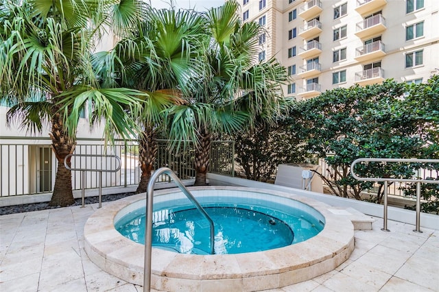 450 Knights Run Ave Unit 2004, Tampa, FL 33602 - view of swimming pool featuring a community hot tub