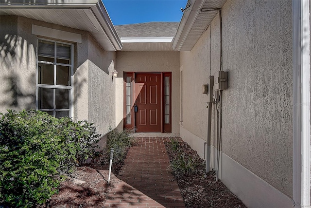 29417 Caddyshack Ln, San Antonio, FL 33576 - property entrance featuring stucco siding and roof with shingles