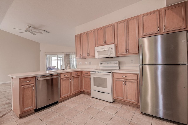 29417 Caddyshack Ln, San Antonio, FL 33576 - kitchen featuring stainless steel appliances, a peninsula, light tile patterned flooring, light countertops, and a ceiling fan